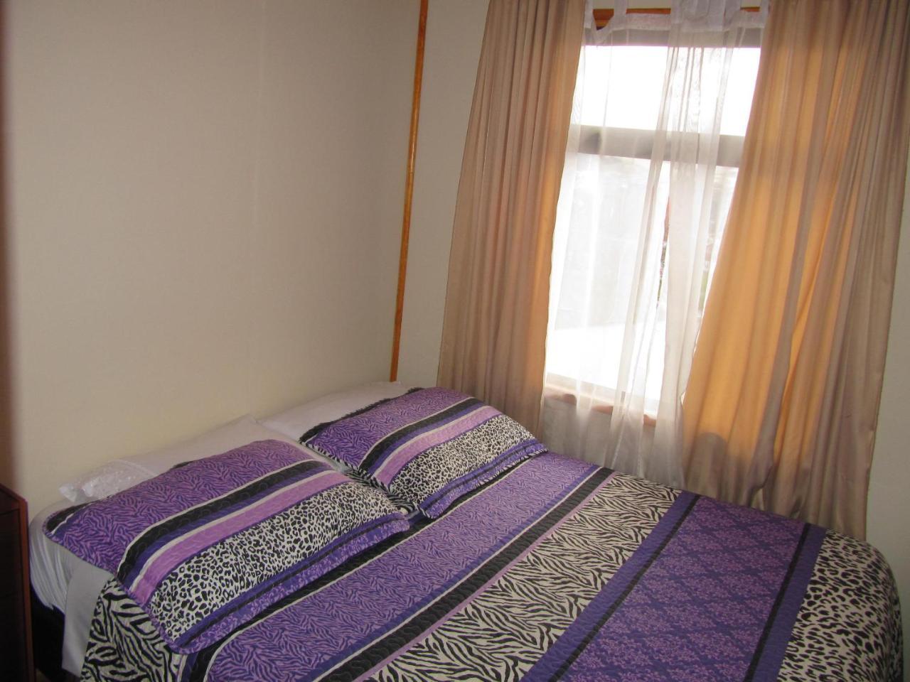 Hospedaje Los Cipreses Coyhaique Buitenkant foto